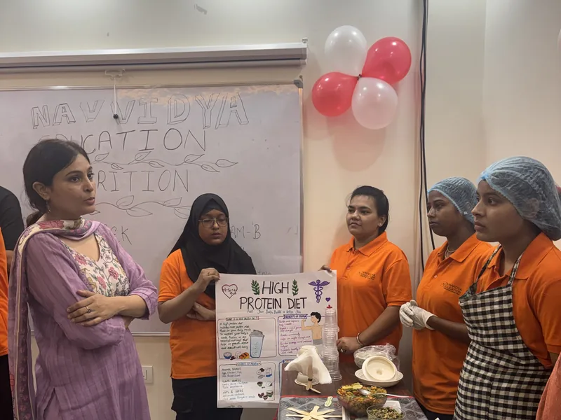 Faculty teaching students about nutrition at Navvidya