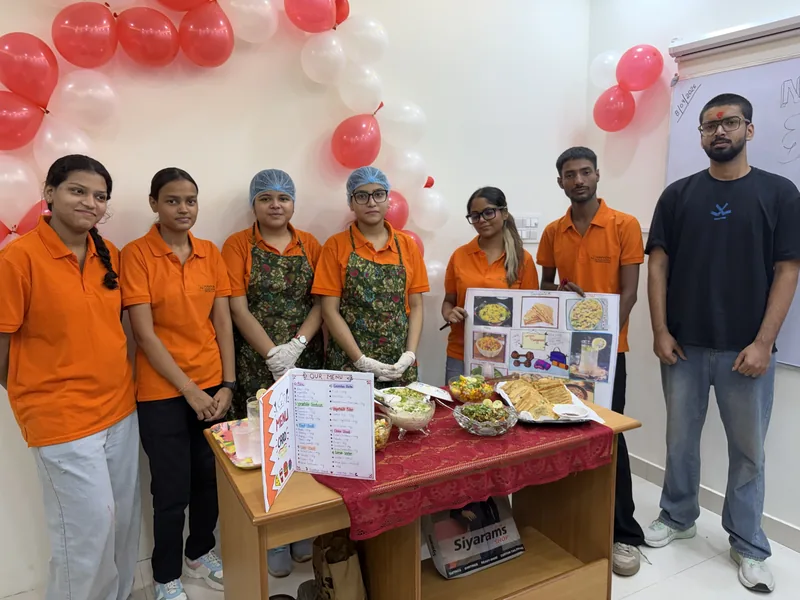 Students presenting a nutrition day project at Navvidya